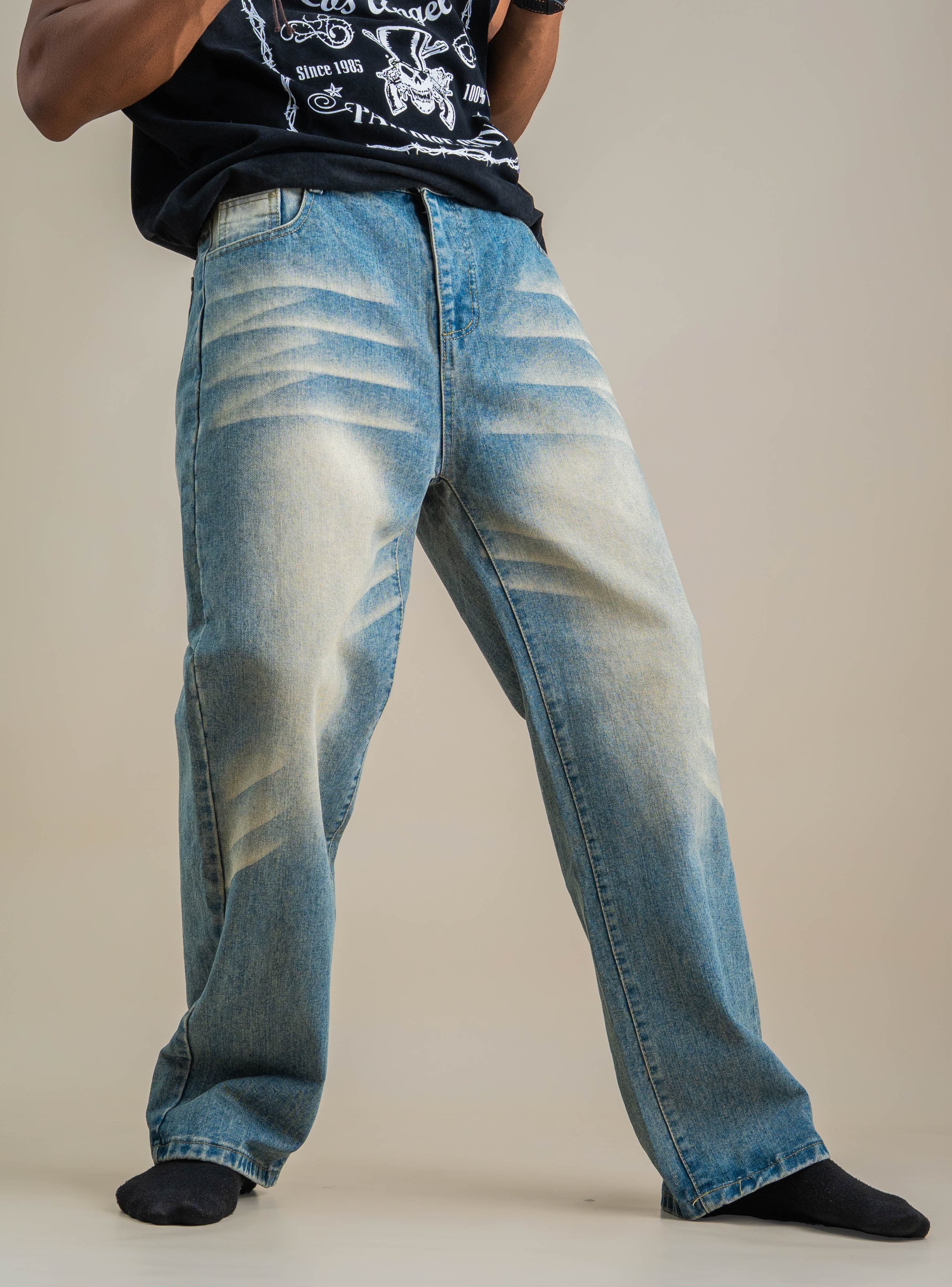 WHISKERED DENIM JEANS