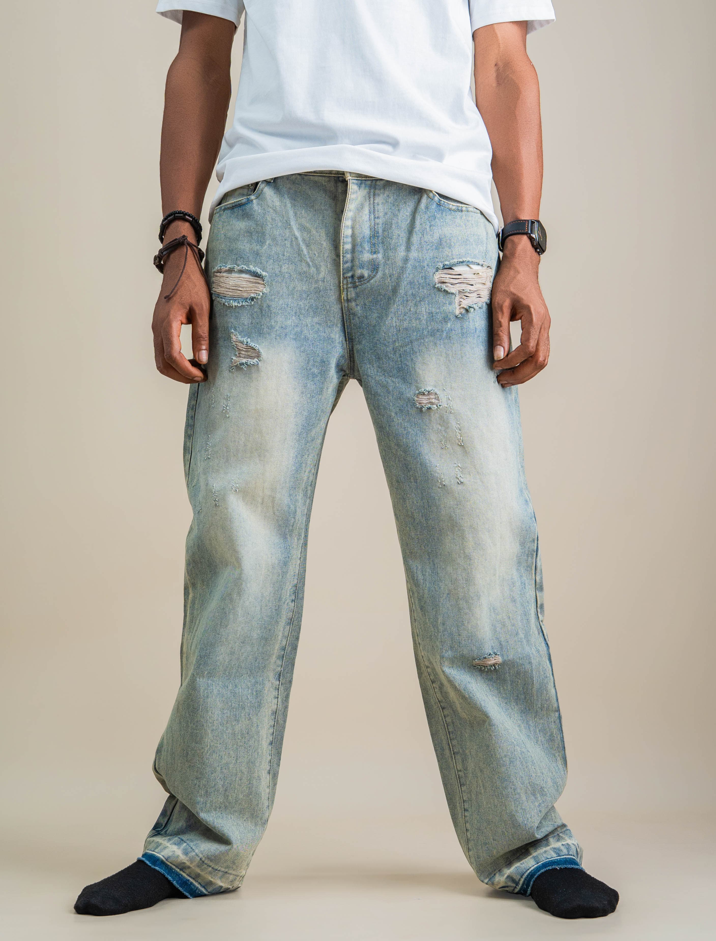 PALE RIPPED DENIM